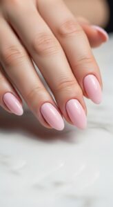 1. Classic Soft Pink Almond Nails
