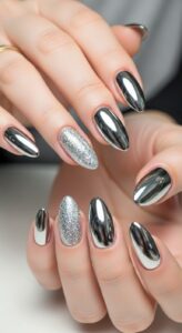9. Chrome Nails with Glitter Accent