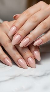 2. Classic Nude Nails with Gloss