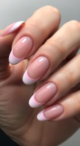 5. Light Pink French Tips (Modern Twist)